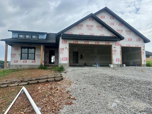 2617 W Webb Rd, Ozark, MO 65721 - unfinished property featuring driveway and a garage