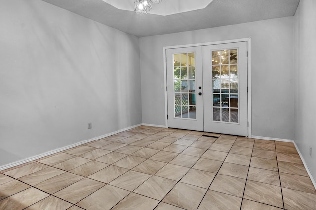 519 N Lynette Ave, Republic, MO 65738 - spare room with french doors and tile patterned floors