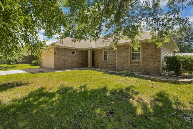 519 N Lynette Ave, Republic, MO 65738 - view of front of house featuring brick siding, an attached garage, concrete driveway, and a front yard