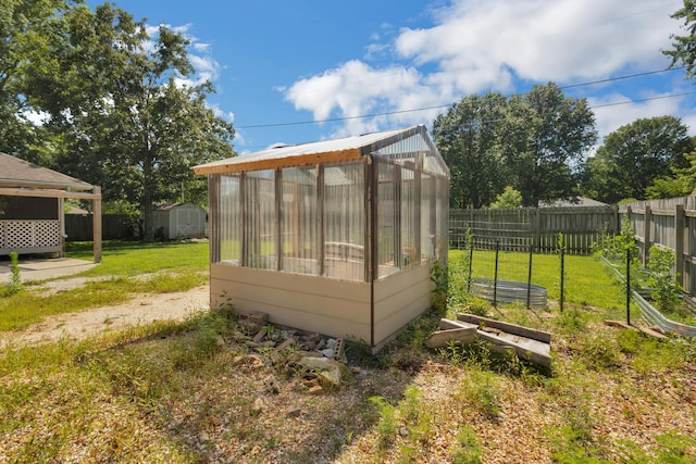 519 N Lynette Ave, Republic, MO 65738 - view of greenhouse featuring a fenced backyard