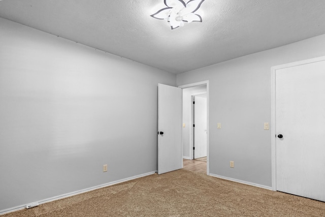 519 N Lynette Ave, Republic, MO 65738 - unfurnished bedroom featuring carpet and baseboards
