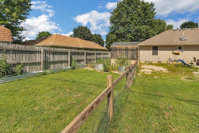 519 N Lynette Ave, Republic, MO 65738 - fenced yard with a greenhouse and an outdoor structure