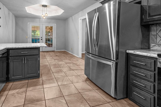 519 N Lynette Ave, Republic, MO 65738 - kitchen featuring freestanding refrigerator, french doors, and light tile patterned floors