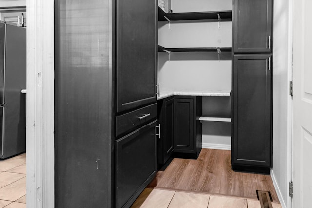 519 N Lynette Ave, Republic, MO 65738 - spacious closet featuring light tile patterned floors