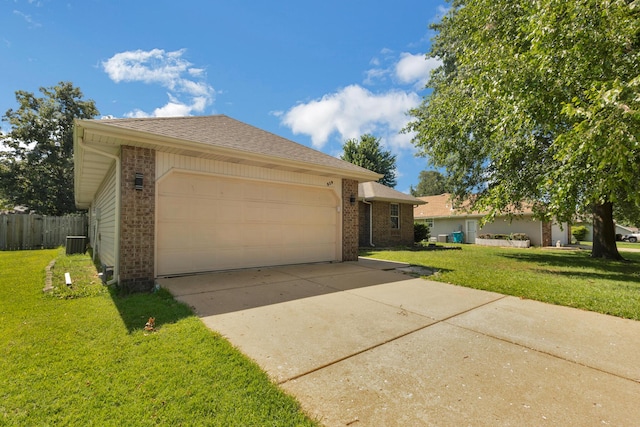 519 N Lynette Ave, Republic, MO 65738 - single story home with brick siding, an attached garage, concrete driveway, and a shingled roof