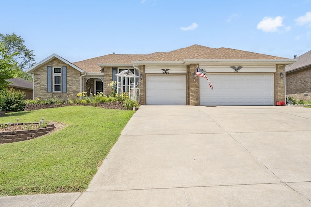 3045 S Palisades Dr, Springfield, MO 65807 - ranch-style house with driveway, brick siding, a garage, a front yard, and a shingled roof