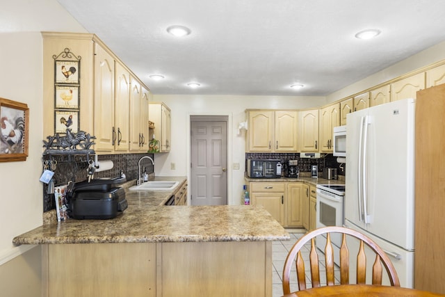 3045 S Palisades Dr, Springfield, MO 65807 - kitchen with white appliances, light brown cabinets, and decorative backsplash