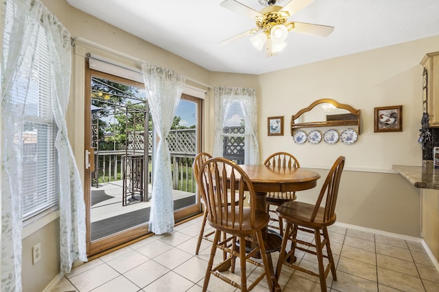 3045 S Palisades Dr, Springfield, MO 65807 - dining area with light tile patterned flooring and ceiling fan