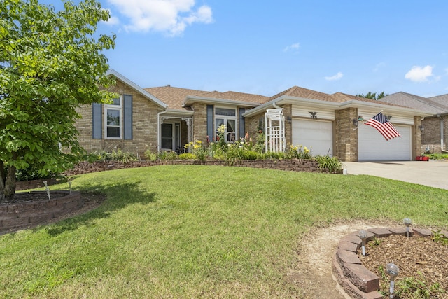 3045 S Palisades Dr, Springfield, MO 65807 - view of front of house with brick siding, an attached garage, driveway, and a front yard