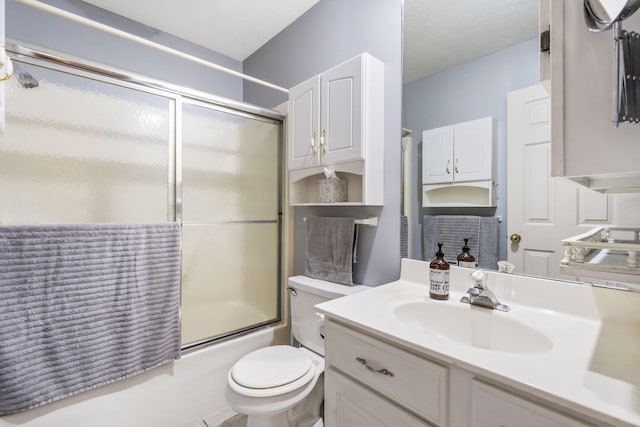 3045 S Palisades Dr, Springfield, MO 65807 - bathroom featuring bath / shower combo with glass door and vanity
