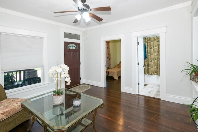628 W Lynn St, Springfield, MO 65802 - living room featuring wood finished floors, crown molding, and ceiling fan