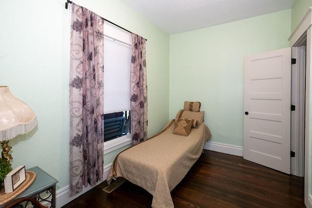 628 W Lynn St, Springfield, MO 65802 - bedroom featuring wood finished floors