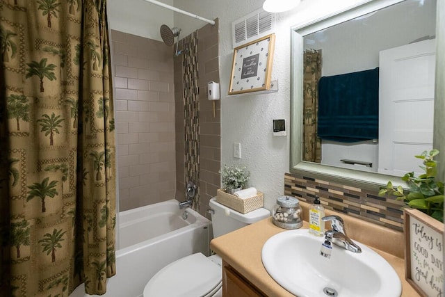 628 W Lynn St, Springfield, MO 65802 - full bath featuring shower / tub combo with curtain, vanity, a textured wall, and backsplash