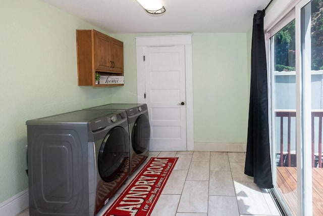 628 W Lynn St, Springfield, MO 65802 - laundry room with cabinet space and washing machine and clothes dryer