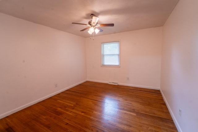 1520 E Seminole St, Springfield, MO 65804 - unfurnished room featuring ceiling fan and wood finished floors