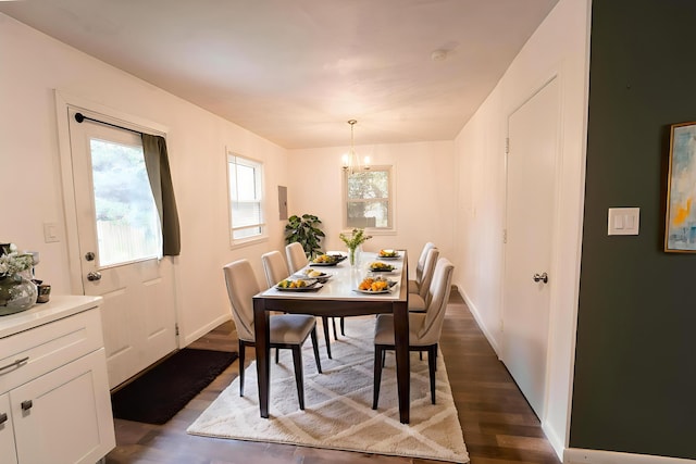 1520 E Seminole St, Springfield, MO 65804 - dining space with a chandelier and dark wood-style flooring