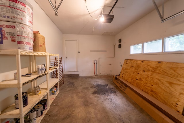 1520 E Seminole St, Springfield, MO 65804 - garage featuring a garage door opener