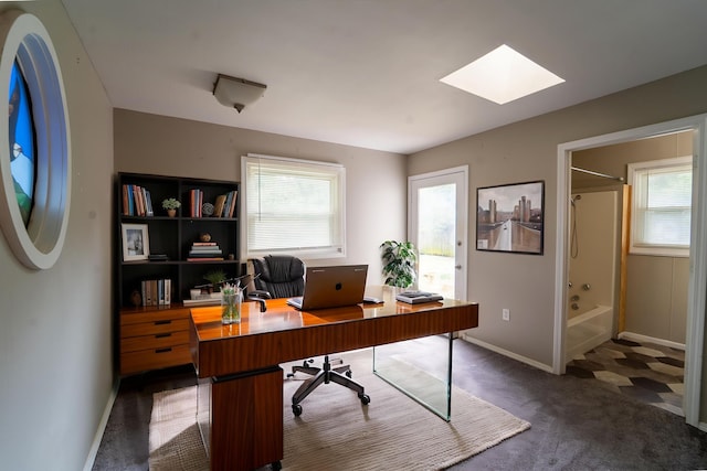 1520 E Seminole St, Springfield, MO 65804 - carpeted home office featuring plenty of natural light and a skylight