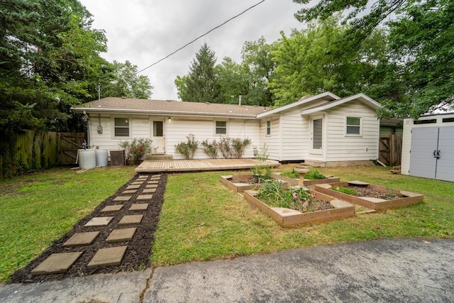 1520 E Seminole St, Springfield, MO 65804 - rear view of house featuring a garden and a wooden deck