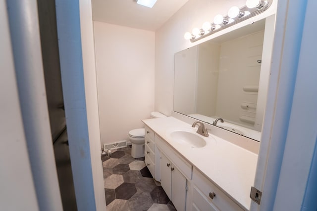 1520 E Seminole St, Springfield, MO 65804 - bathroom featuring vanity and toilet