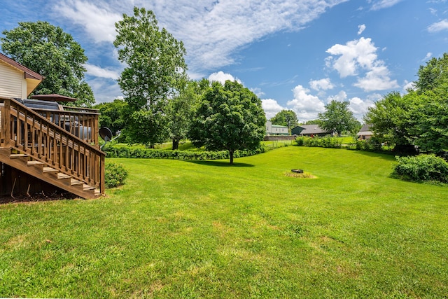 1604 E Sycamore St, Ozark, MO 65721 - view of grassy yard with stairway and a wooden deck