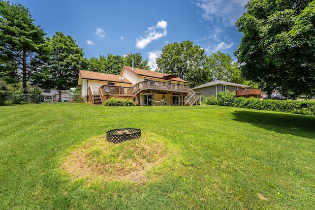 1604 E Sycamore St, Ozark, MO 65721 - back of house featuring stairway, a deck, and a fire pit
