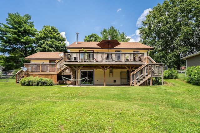 1604 E Sycamore St, Ozark, MO 65721 - rear view of property with stairway and a wooden deck