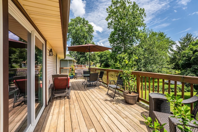 1604 E Sycamore St, Ozark, MO 65721 - deck featuring outdoor dining space