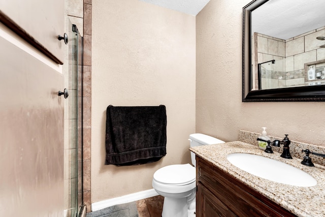 1604 E Sycamore St, Ozark, MO 65721 - full bath featuring a tile shower, vanity, and a textured wall