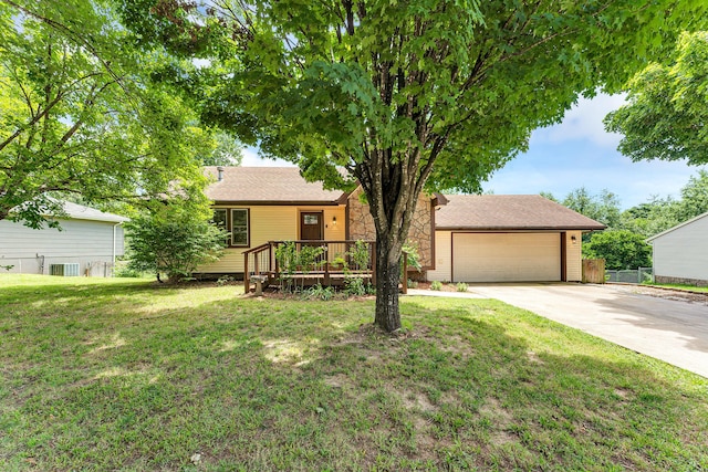 1604 E Sycamore St, Ozark, MO 65721 - ranch-style house with concrete driveway, stone siding, and a garage
