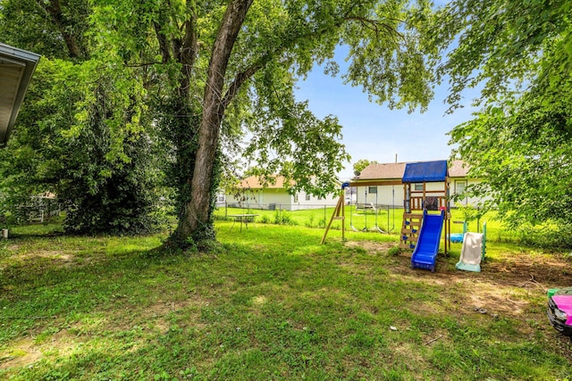 1860 E Division St, Bolivar, MO 65613 - view of yard with a playground