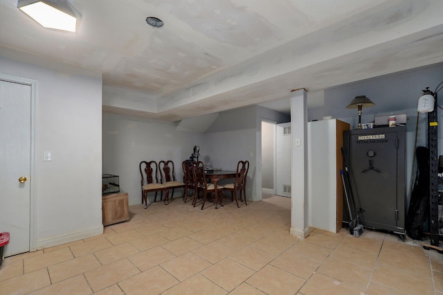 3239 W Erie St, Springfield, MO 65807 - below grade area with light tile patterned floors and baseboards
