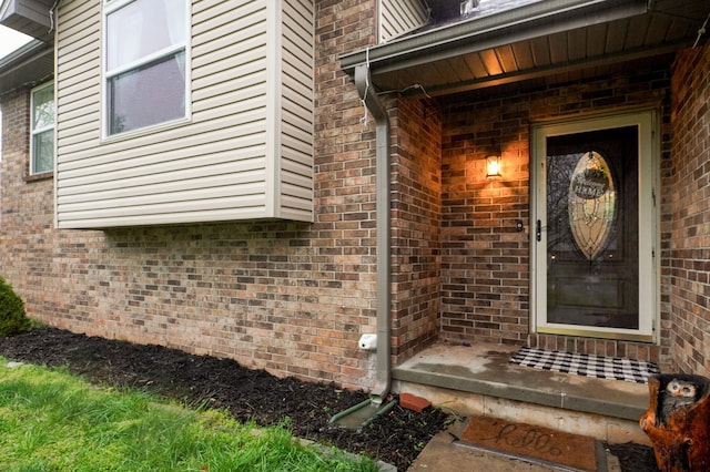3239 W Erie St, Springfield, MO 65807 - view of exterior entry featuring brick siding