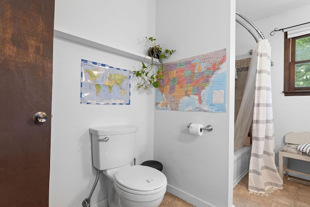 189 Pierce Pl, Forsyth, MO 65653 - bathroom featuring shower / bath combo with shower curtain and tile patterned flooring
