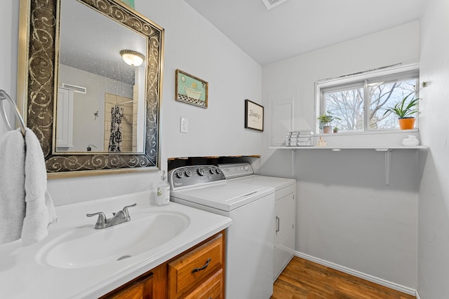 189 Pierce Pl, Forsyth, MO 65653 - laundry area with independent washer and dryer and dark wood finished floors