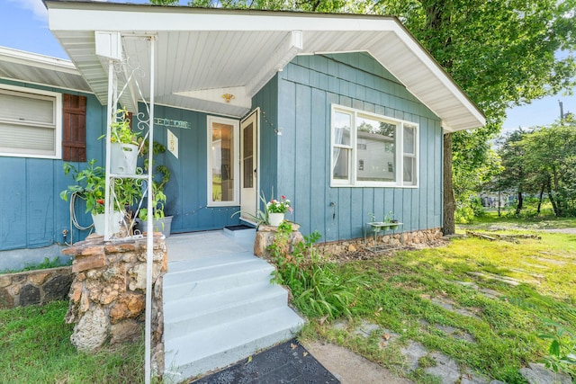 189 Pierce Pl, Forsyth, MO 65653 - property entrance with board and batten siding and a porch