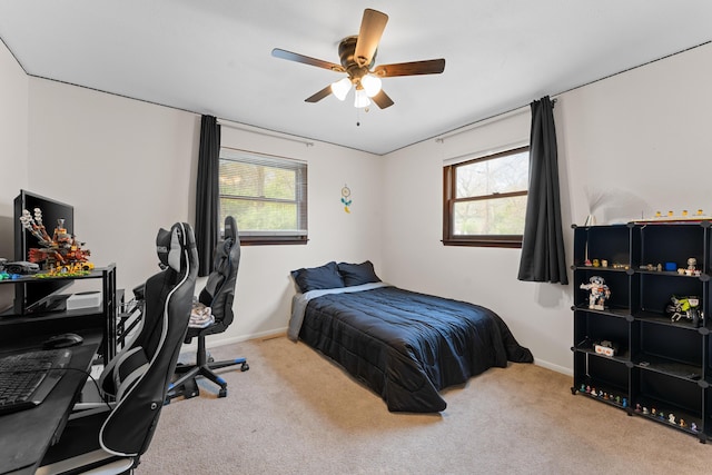 189 Pierce Pl, Forsyth, MO 65653 - carpeted bedroom with a desk and ceiling fan