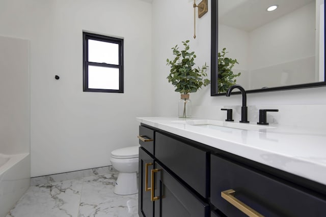 2112 N Sun Valley Dr, Springfield, MO 65802 - bathroom with vanity, a tub, marble finish floors, and recessed lighting