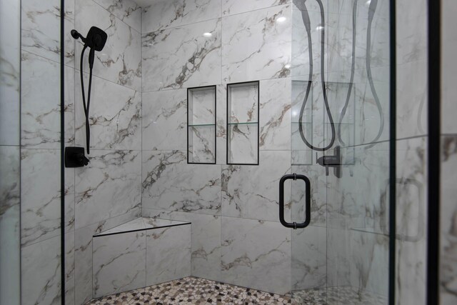 2112 N Sun Valley Dr, Springfield, MO 65802 - full bathroom featuring a marble finish shower