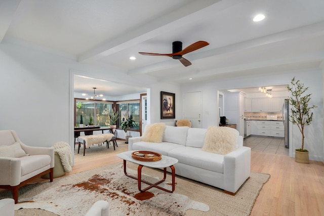 1923 S Cedarbrook Ave, Springfield, MO 65804 - living room featuring beam ceiling, light wood-style floors, recessed lighting, a chandelier, and a ceiling fan