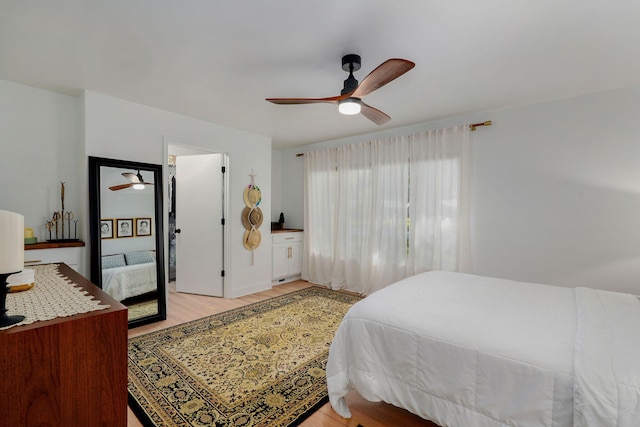 1923 S Cedarbrook Ave, Springfield, MO 65804 - bedroom with light wood finished floors and a ceiling fan
