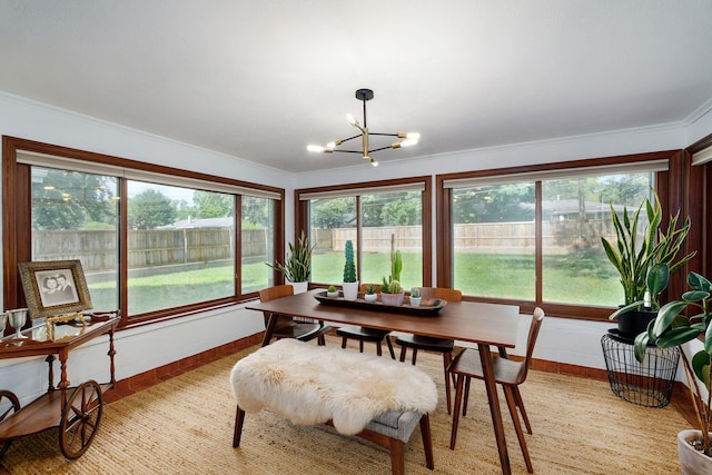 1923 S Cedarbrook Ave, Springfield, MO 65804 - dining space with a chandelier and crown molding