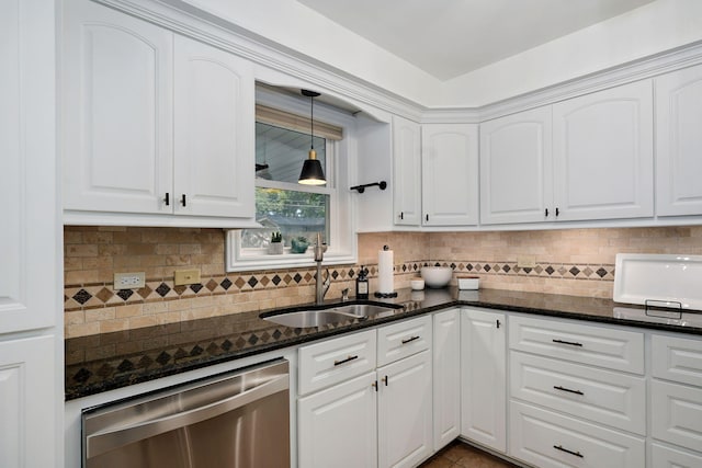 1923 S Cedarbrook Ave, Springfield, MO 65804 - kitchen featuring stainless steel dishwasher, white cabinetry, dark stone countertops, hanging light fixtures, and backsplash