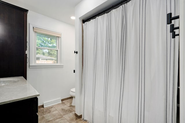 1923 S Cedarbrook Ave, Springfield, MO 65804 - bathroom featuring vanity and recessed lighting