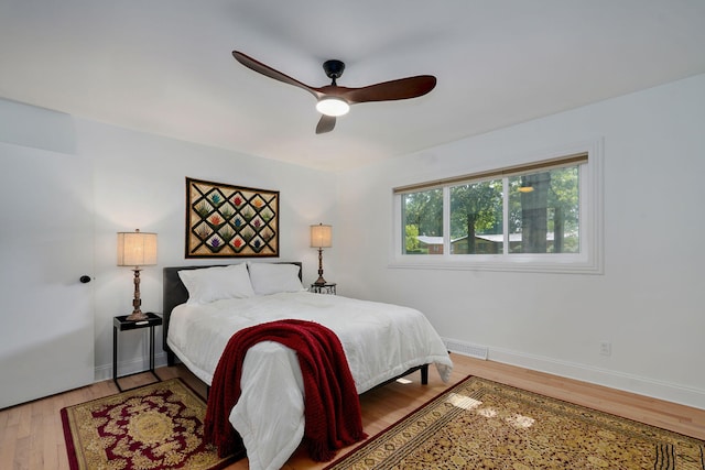 1923 S Cedarbrook Ave, Springfield, MO 65804 - bedroom featuring wood finished floors and ceiling fan