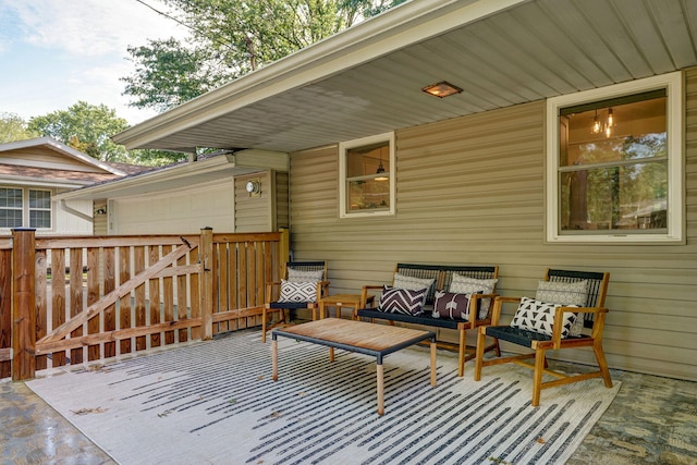 1923 S Cedarbrook Ave, Springfield, MO 65804 - wooden terrace with an outdoor hangout area and a garage