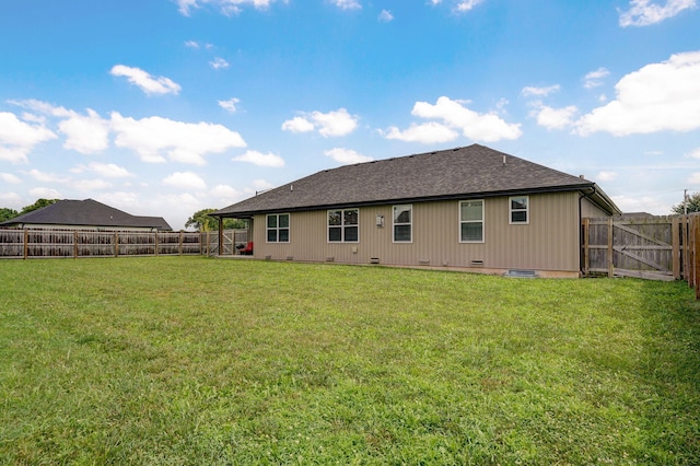 917 W Charlotte St, Republic, MO 65738 - rear view of property featuring a fenced backyard and roof with shingles