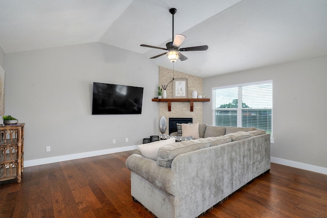 917 W Charlotte St, Republic, MO 65738 - living room featuring a ceiling fan, a fireplace, vaulted ceiling, and wood finished floors