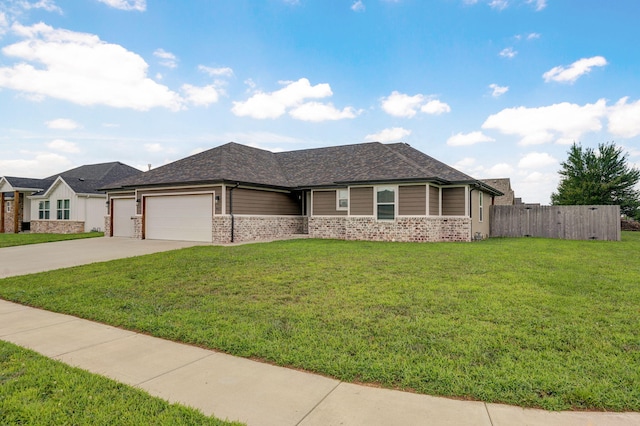 917 W Charlotte St, Republic, MO 65738 - view of front of property featuring brick siding, a garage, driveway, and roof with shingles