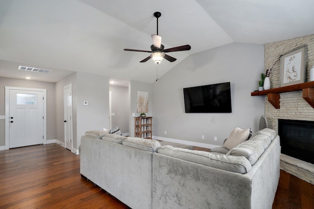 917 W Charlotte St, Republic, MO 65738 - living area featuring a ceiling fan, vaulted ceiling, dark wood-style floors, and a brick fireplace